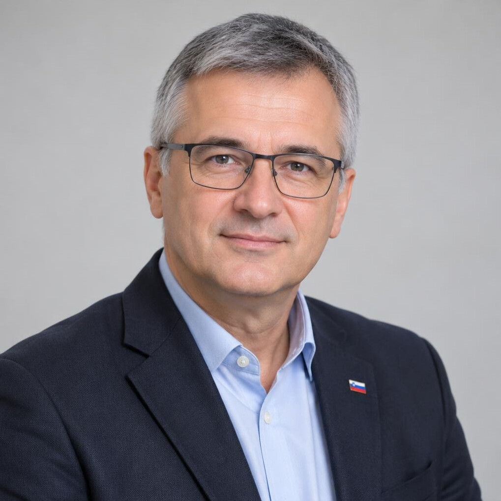 Portrait of a mature man with grey hair and glasses