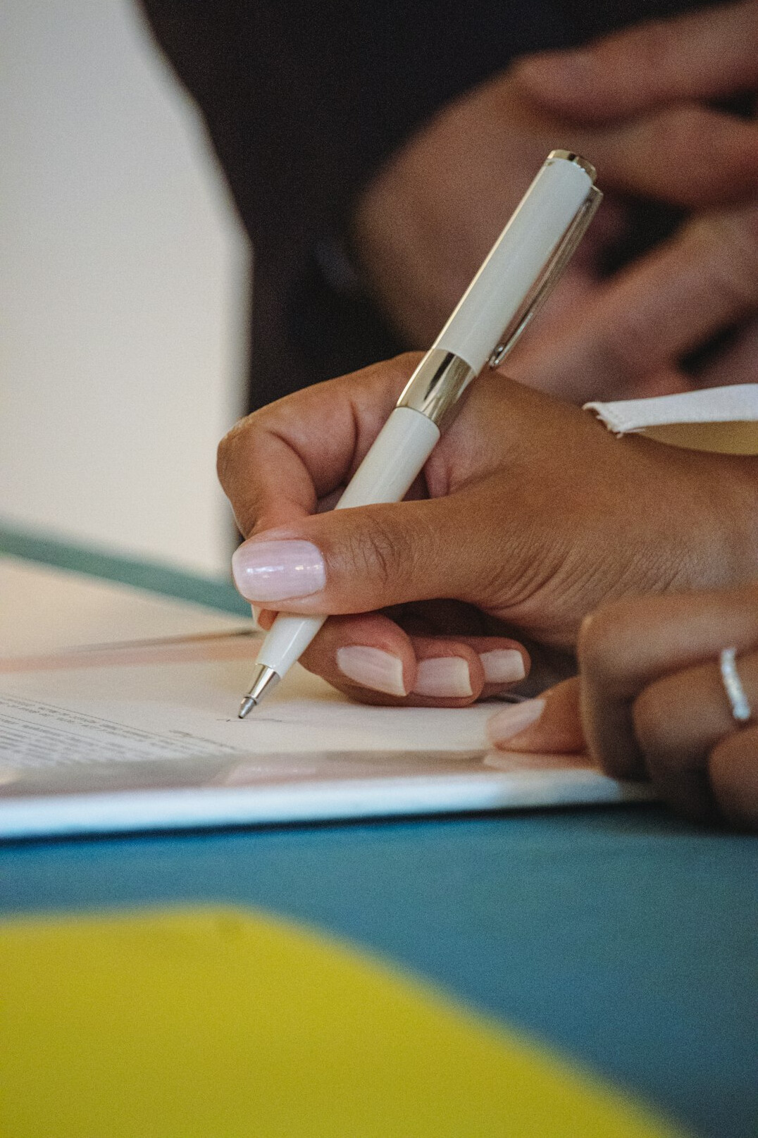 person signing health insurance contract